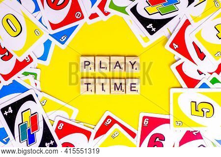 Minsk, Belarus - March 30, 2021: Top View Of Table Leisure Family Game Uno Playing Cards With Play T