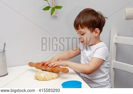 Little Boy Helps Mother To Cook  Making Homemade Coockies. Casual Lifestyle In Home Interior, Pretty