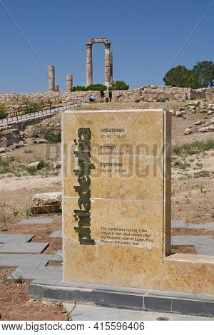 AMMAN, JORDAN - JULY 21, 2015: Sign at The Temple of Hercules at the Citadel of Amman, Jordan. Philadelphia is the former name of Amman.