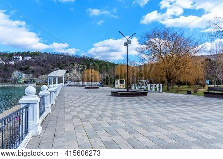 Abrau Durso, Russia - March 2, 2021: Beautiful View Of The Shore Of Lake Abrau In Early Spring. Pict