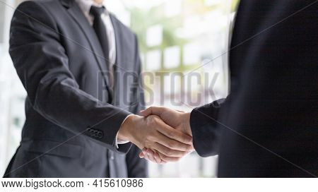 Handshake, Both business people shake hands to celebrate financial success, Build friendship by hold
