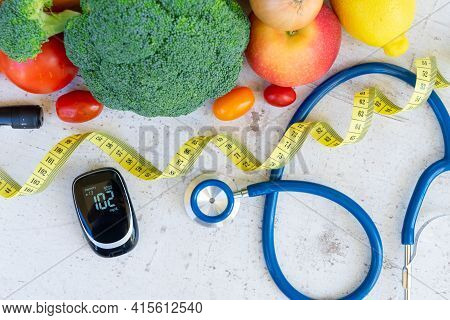 Raw Vegetables With Blood Glucose Meter, Lancet, Measuring Tape And Stethoscope, Diabetes Healthy Di