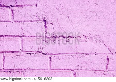 Texture Of A Brick Wall Partially Covered With Plasterwork And Painted In Pink Color As A Background