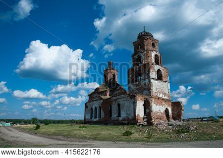 Old Dilapidated Church On A Sunny Day With Blue Sky
