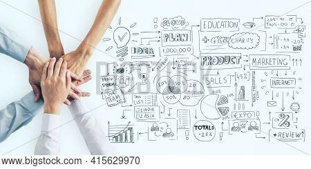 Business Plan Concept With Human Hands In A Pile And Handwritten Sketch Of Business Indicators And S