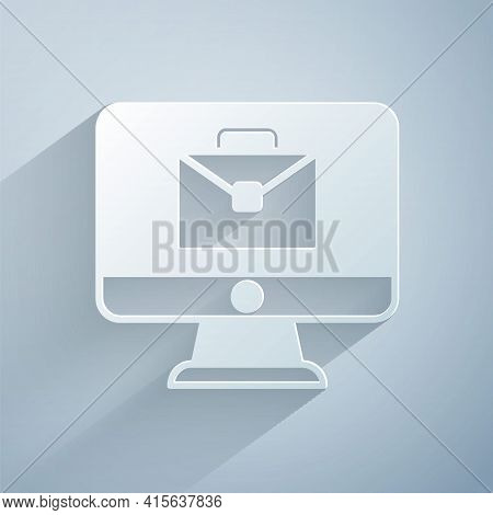 Paper Cut Online Working Icon Isolated On Grey Background. Freelancer Man Working On Laptop At His H