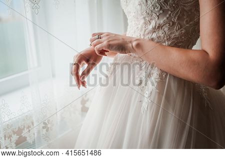 Bride In White Drress Wearing Bracelet On The Hand