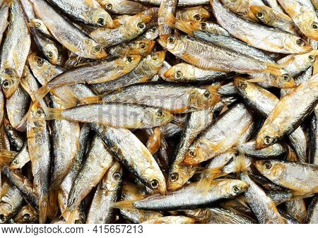 Small Cold Smoked Fish Background Close Up. The View From Top