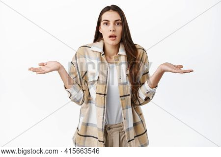 I Dont Know. Confused And Clueless Woman Shaking Head And Shrugging, Look Puzzled, Cant Tell, Know N