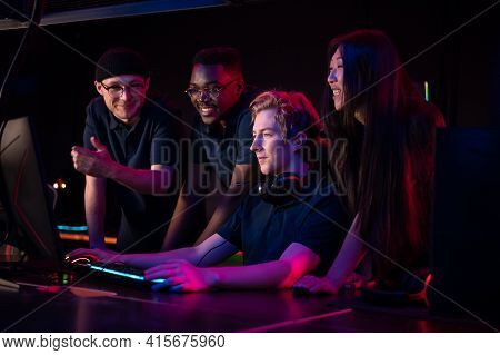 During An Esports Training Session, A Team Of Boys And Girls Sort Out The Latest Game And Smile