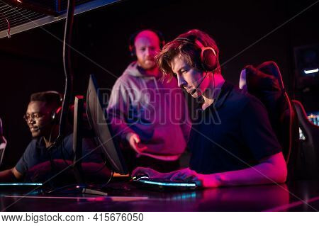 During A Computer Games Tournament, A Young Guy Is Nervous, The Coach Tells Him The Tactics Of The F