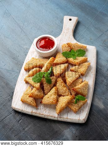 Asian Traditional Prawn Toast With Sesame Seeds And Sweet Chilli Sauce On Wooden White Board