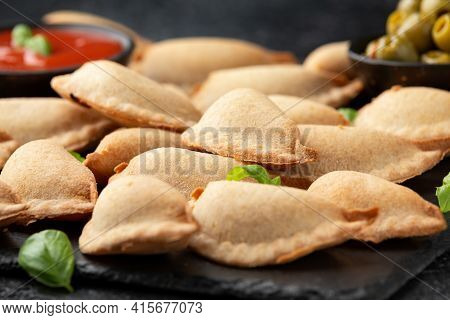 Margarita Margherita Pizza Parcels Pockets Filled With Tomato, Mozzarella Cheese And Basil Served On