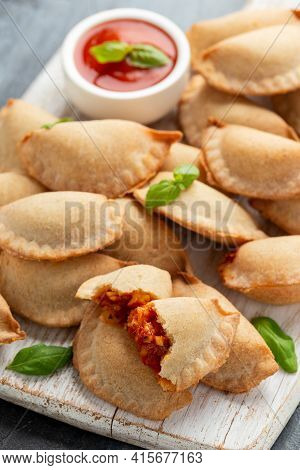 Margarita Margherita Pizza Parcels Pockets Filled With Tomato, Mozzarella Cheese And Basil Served On