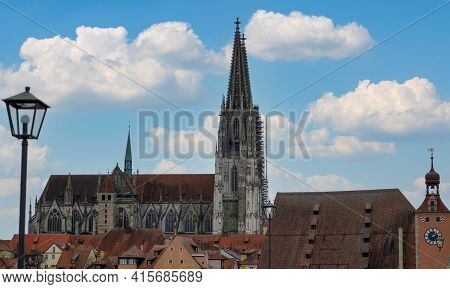 Stone Bridge In Regensburg Over The Danube With Cathedral And Bruck Mandl