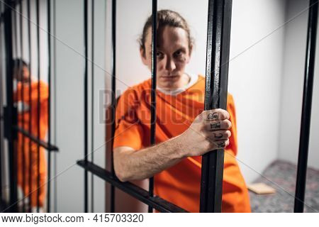 A Desperate Criminal Maniac With Tattoos In A Solitary Cell Is Kept Behind Bars. A Hard Look At The 