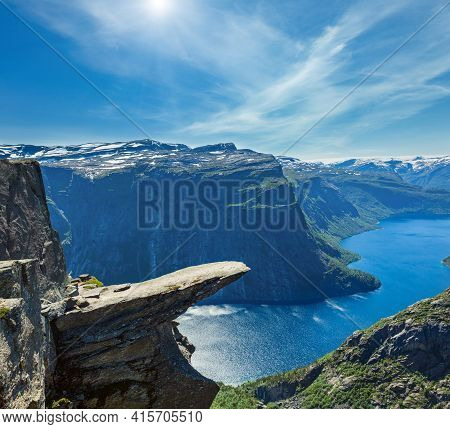 The Summer Sunshiny View Of Trolltunga (famous The Troll's Tongue Norvegian Destination) And Ringeda