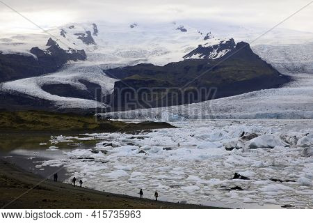 Fjallsarlon / Iceland - August 18, 2017: Fjallsarlon Glacier Lagoon View With Ice Formations, Icelan