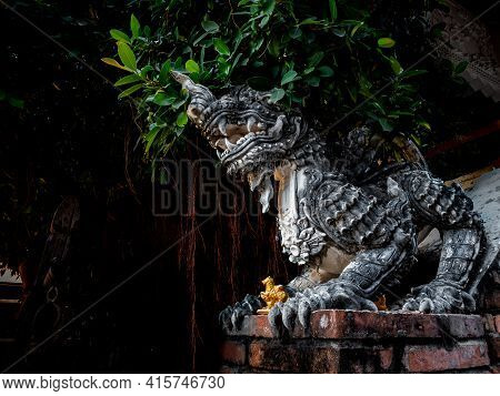 Ancient Himmapan Leo Statue Guarding The Foot Of The Stairs Up The Temple Hall