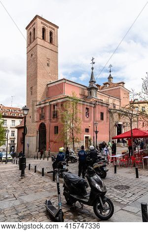 Madrid, Spain - April, 2, 2021: Police Officers At The Entrance Of The Medieval Church Of San Pedro 