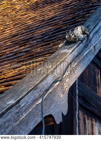 Sculpture Of Mom At The Roof Of Temple Building In Northern Provinces Of Thailand