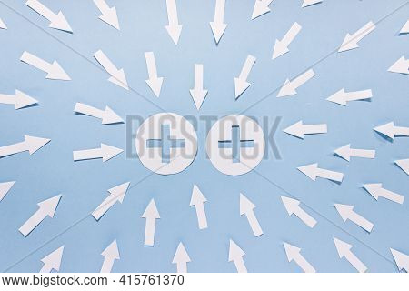 Simple Concept Of Attraction. Two Positive Charges With Many Poiting Arrows On Blue Background.