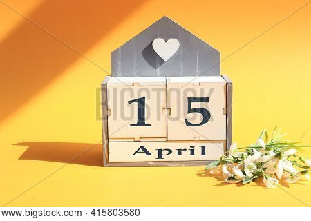 .calendar For April 15 : Cubes With The Numbers 0 And 14, The Name Of The Month Of April In English,