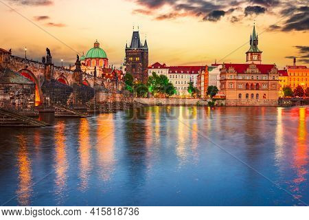 Prague, Czech Republic. Charles Bridge Over Vltava River Sunset And Stare Mesto, Bohemia Famous Plac