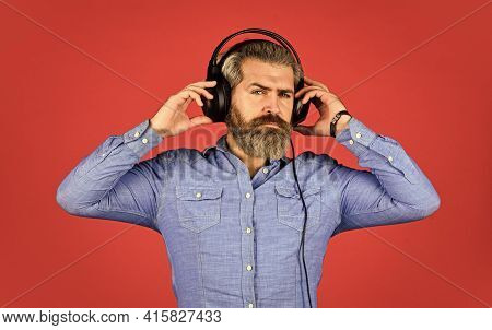 Man Listening Music With His Headphones. Bearded Man Hipster In Headset. Listening To Music. Time To