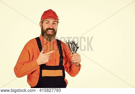 Wrench Tool. Automotive Service Technicians And Mechanics. Man Hold Wrench Tools. In Repairing Cars 