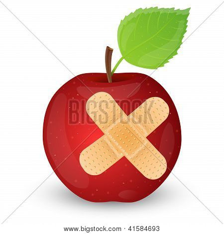 Manzana roja con esparadrapo.