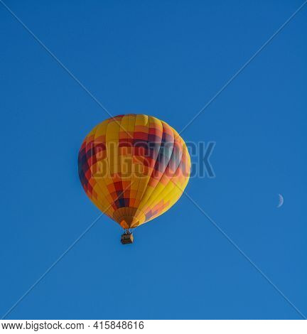 Peaceful Flight Over Sunny Arizona In A Brightly Colored Hot Air Balloon. Maricopa County, Arizona