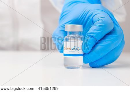 Curevac Vial Or Bottle For Injection With Pharmaceuticals Or Drugs In Scientist Hands In Rubber Glov