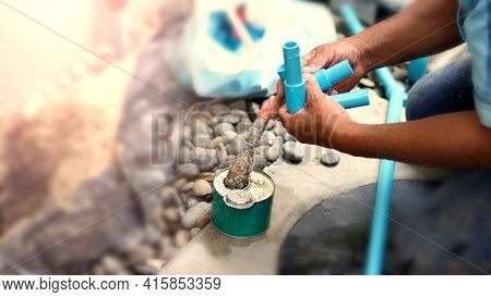 Fixing Water Pipe At Home Outdoor Which Broken Or Damage. Cause Of Leaking Clean Water And Need To F