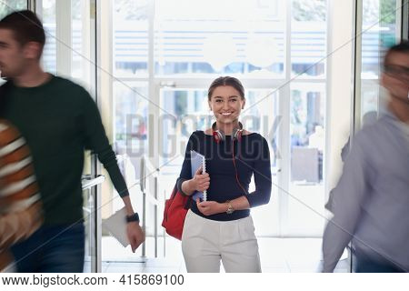 famel student with modern technology in school
