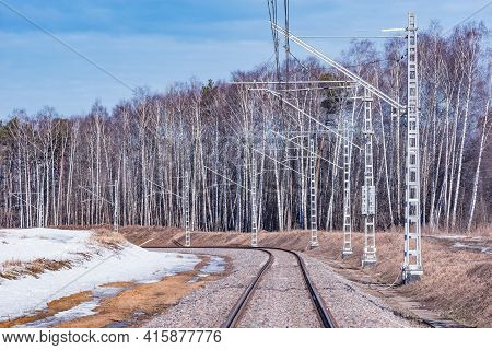 Electrified Railway Line At Winter Day Time.