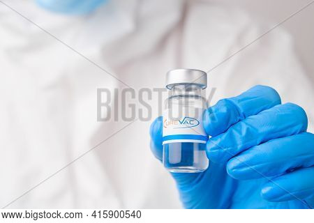 Curevac Vial Or Bottle For Injection With Pharmaceuticals Or Drugs In Scientist Hands In Rubber Glov