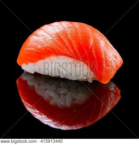 Sushi Syake With Salmon On A Black Background