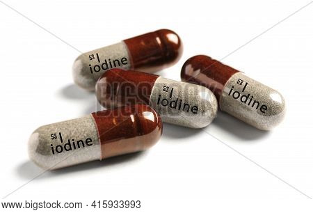 Iodine Capsules On White Background. Mineral Element