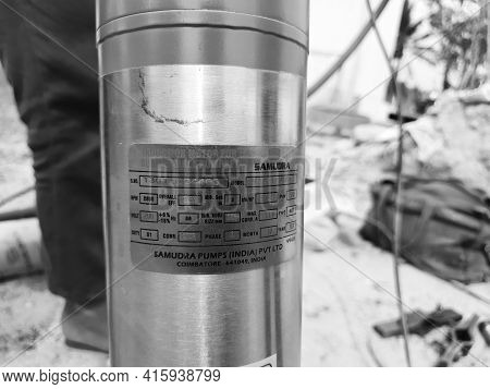 Closeup Of Samudra Submersible Pump Holding In A Hand And Packaged Pack Pipe Shape.