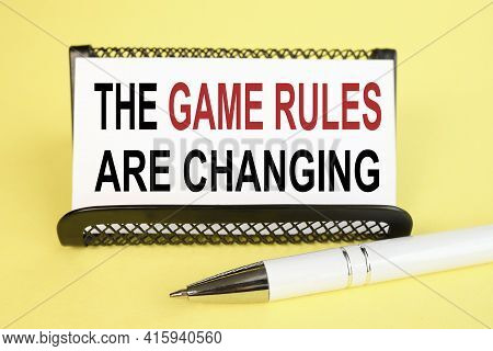 The Game Rules Are Changing. Text On White Paper On A Yellow Background