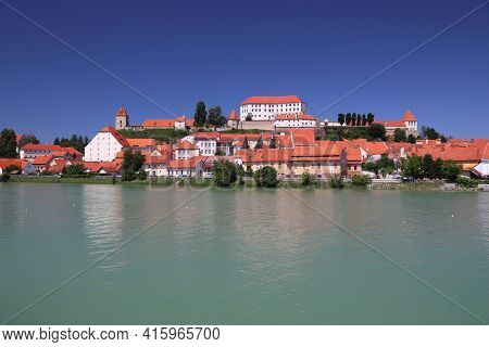 Ptuj Castle In Slovenia. Medieval Landmark Alongside Drava River In Ptuj.