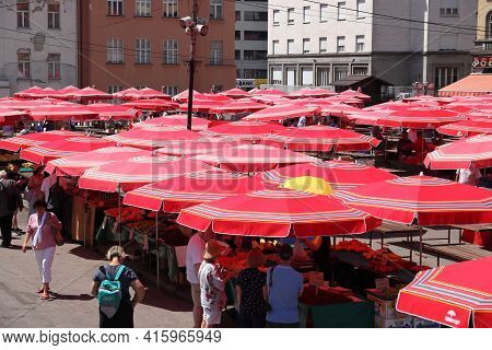 Zagreb, Croatia - June 30, 2019: People Visit Dolac Market Place In Zagreb, Capital City Of Croatia.