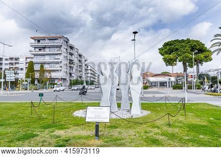 Cagnes -sur-mer, France - 25.03.2021: City Sculpture The Crowd. Art Performance In French Riviera. H