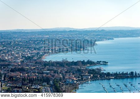 Aerial View Of The Lake Garda (lago Di Garda) With The Small Villages Of Bardolino, Cisano And Lazis