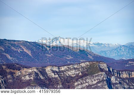 Mountain Range Of The Adamello With The Peak Of Care Alto, And The Baldo Mountain (monte Baldo), Fro