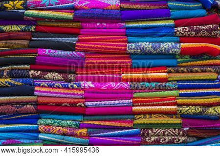 Closeup Image Of Classical Colorful Peruvian And Bolvian Clothes And Handicraft At The Indigenous Ma