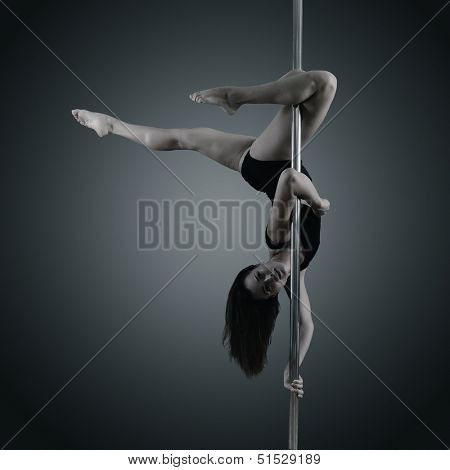pole dancer, young woman dancing on pylon, toned and noise added
