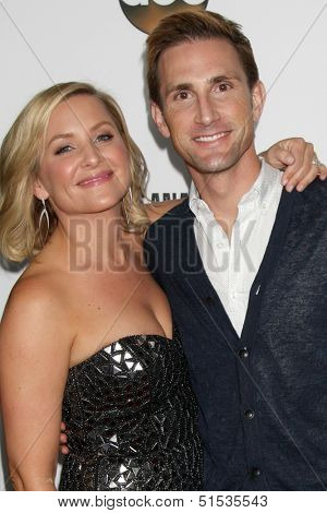 LOS ANGELES - SEP 28:  Jessica Capshaw, Christopher Gavigan at the Grey's Anatomy 200th Show Party at The Colony on September 28, 2013 in Los Angeles, CA