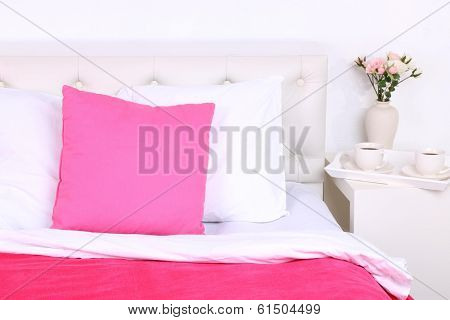 Comfortable soft bed with pillows